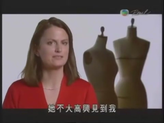 她不大高興見到我